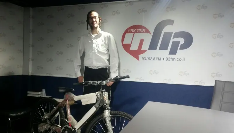 הזוכהבאופניים
