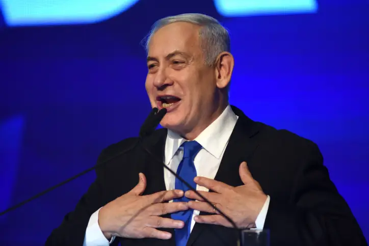 Israeli Prime Minister Benjamin Netanyahu, head of the Likud Party, carries a speach after the release of first voting results in the Israeli general elections