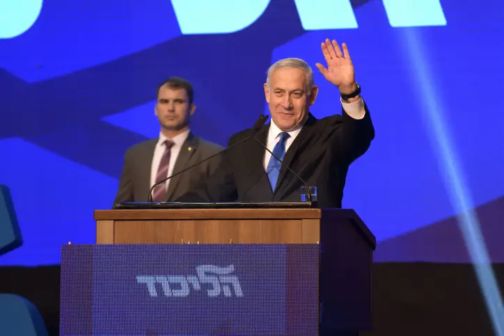 Israeli Prime Minister Benjamin Netanyahu, head of the Likud Party, carries a speach after the release of first voting results in the Israeli general elections