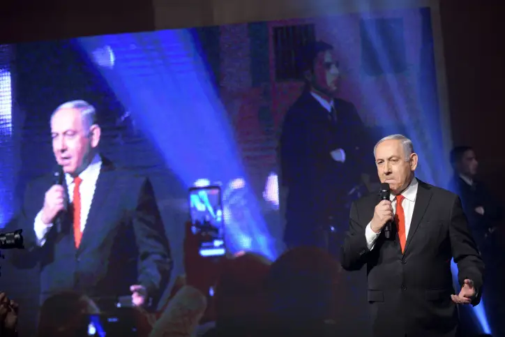 Israeli Prime Minister Benjamin Netanyahu delivers a speach at the Likud Party's campaign opening event