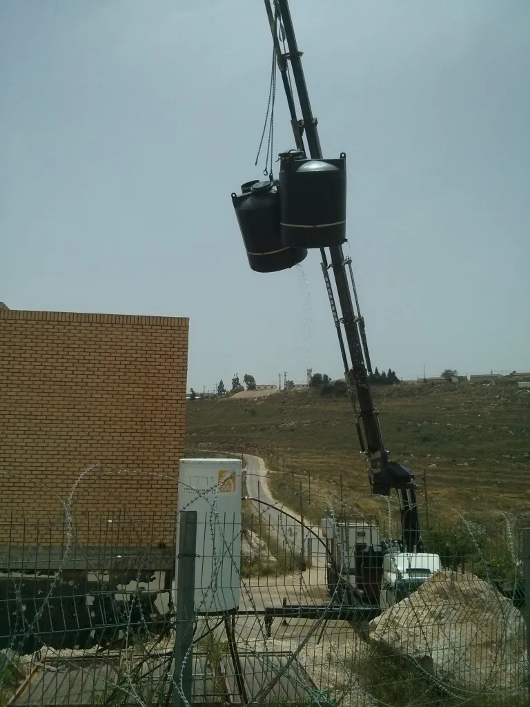 פינוי מיכל מים 1