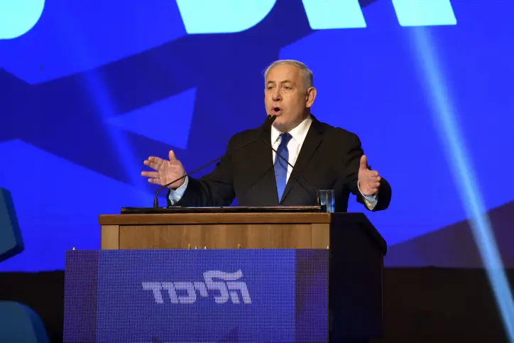 Israeli Prime Minister Benjamin Netanyahu, head of the Likud Party, carries a speach after the release of first voting results in the Israeli general elections