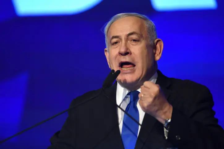 Israeli Prime Minister Benjamin Netanyahu, head of the Likud Party, carries a speach after the release of first voting results in the Israeli general elections